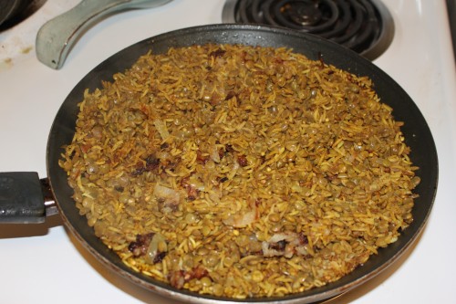 rice and lentils and spice before adding the fried onions