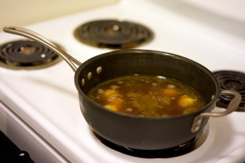 Dumplings simmering in broth