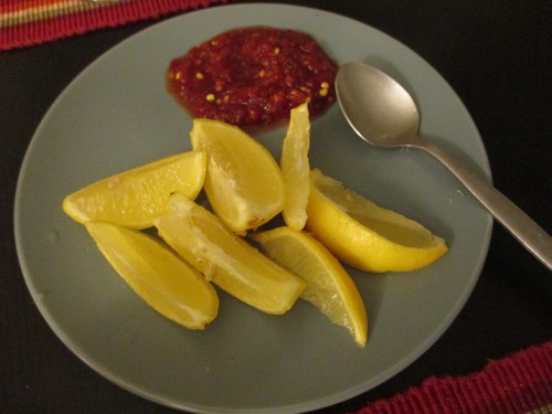 Sambal oelek (savory chili paste) and lemon wedges to accompany the Mee goreng