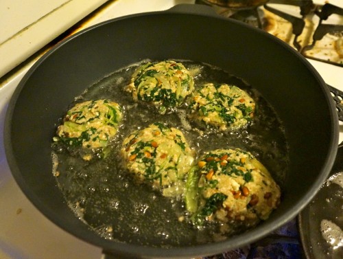 swiss chard cakes frying in oil