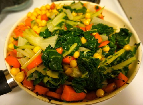 carrots with swiss chard, chicken peas, garlic, and herbs