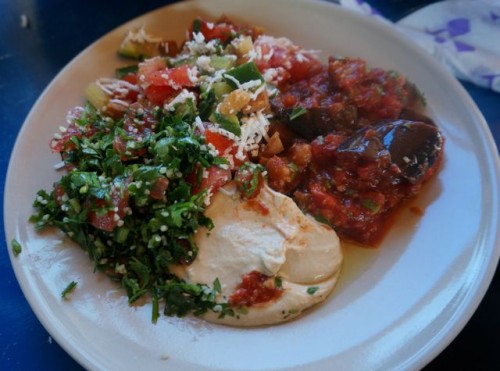 Hummus, fattoush, tabouli, eggplant dish