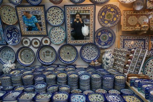 Buying Armenian pottery in the old city. Can you see me with my purchases?