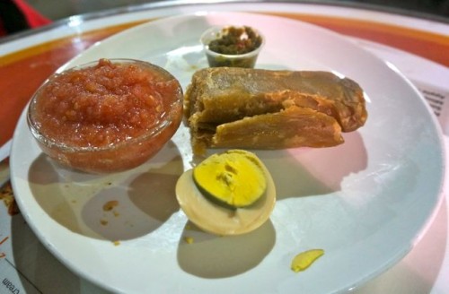 Jachnun, Yemenite jewish pastry It is traditionally served with a crushed tomato dip, hard boiled eggs, and zhug