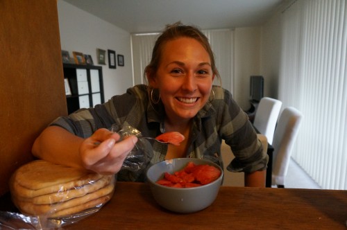 Claire enjoying some watermelon while I make the fattoush