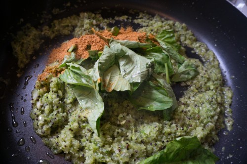 Onion mixture with spice mix and basil leaves