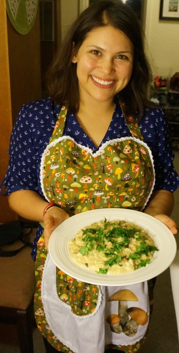 Me showing off my wild mushroom risotto and my awesome mushroom apron