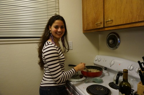 Meera being a good friend and helping me stir the risotto